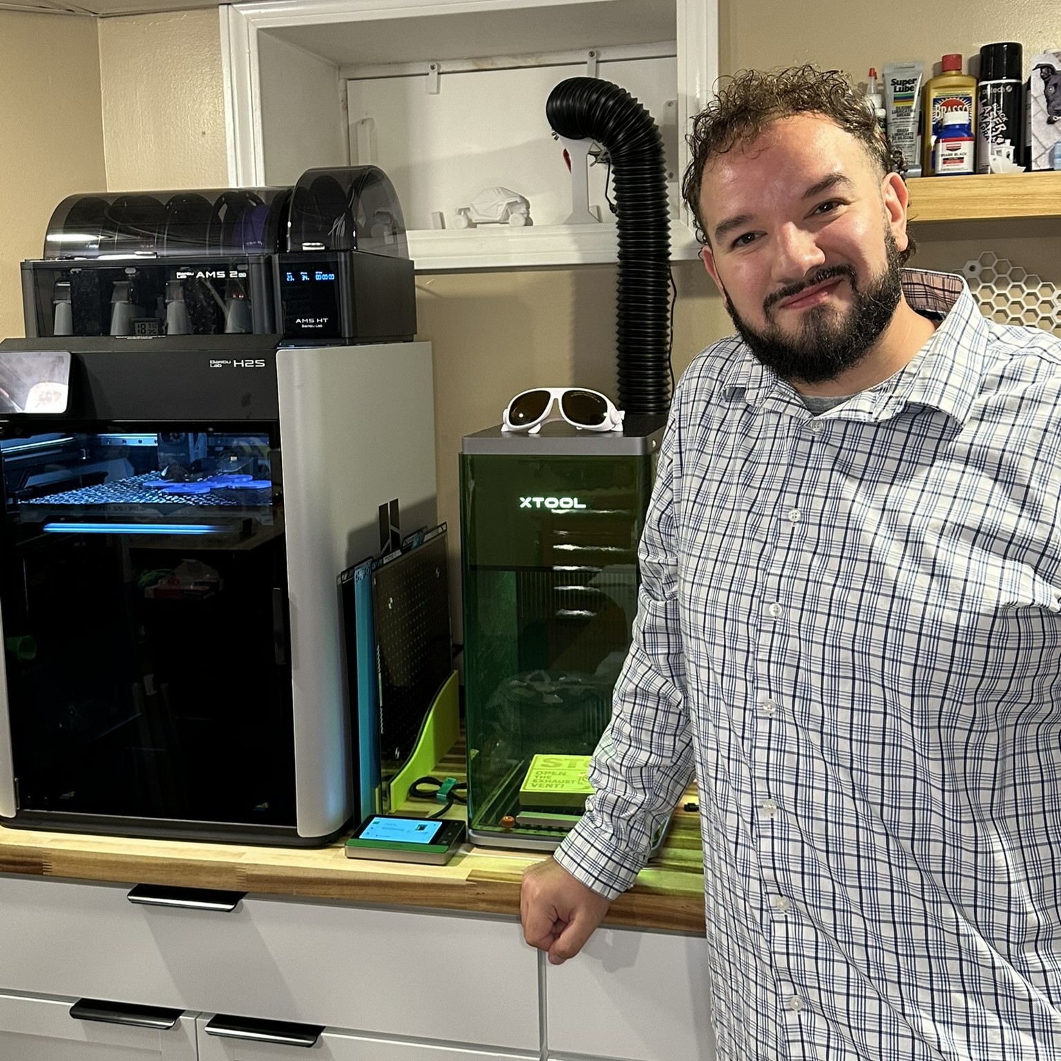 Steve Holder with his 3D printer and laser engraver